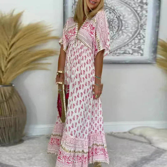 Amelia | Damska sukienka maxi w stylu boho z frędzlami i krótkim rękawem 0