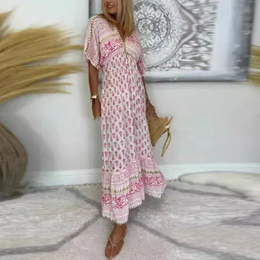 Amelia | Damska sukienka maxi w stylu boho z frędzlami i krótkim rękawem 1