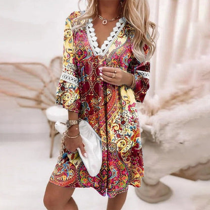 Audrey | Damska mini sukienka boho z kwiatowym wzorem i dekoltem w serek 1