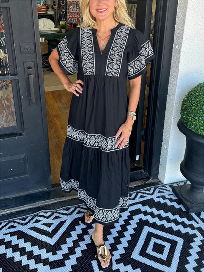 Olivia | Sukienka maxi w stylu boho z dekoltem w serek i haftowanym wycięciem modelującym brzuch 0